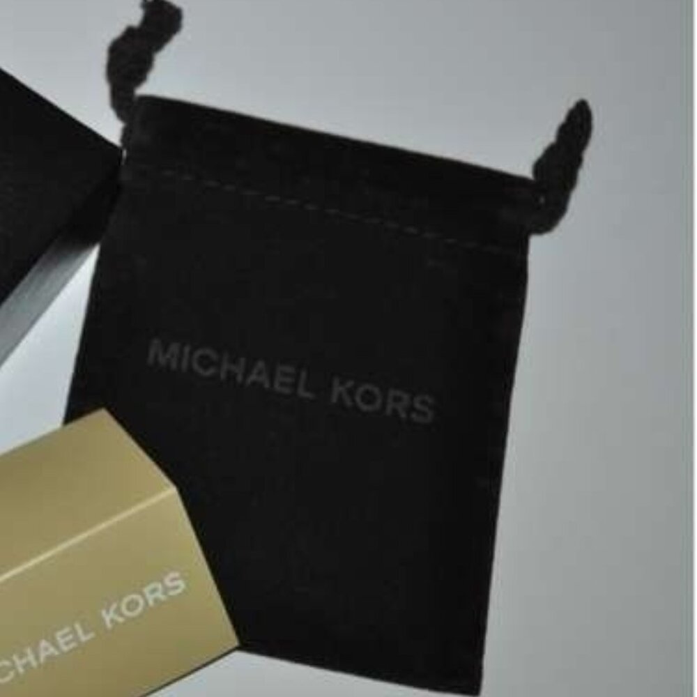 Brown small Michael Kors jewelry bag Measuring 5.5 x 4.5 inches